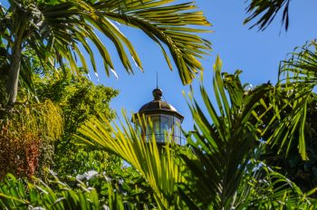 Key West Lighthouse standing tall against a clear blue sky in Key West, Florida