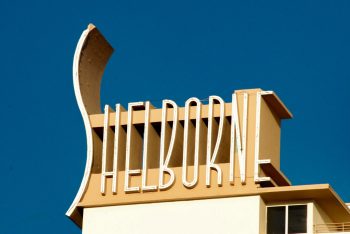 Vibrant view of South Beach in Miami, showcasing art deco buildings and clear blue sky