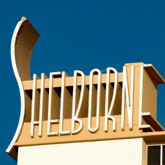 Vibrant view of South Beach in Miami, showcasing art deco buildings and clear blue sky