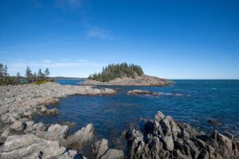 Scenic view of Western Head Preserve Trail in Cutler, Maine, showcasing autumn foliage in October 2025