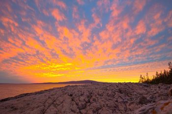 Sunset over Cadillac Mountain viewed from Schoodic Point in Acadia National Park, Maine, October 2025