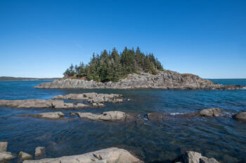 Scenic view of the Western Head Preserve Trail in Cutler, Maine, showcasing autumn foliage and coastal landscape