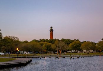 Scenic view of Corolla Lighthouse, North Carolina showcasing coastal landscapes and clear blue skies