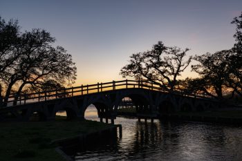 Whalehead Bridge in Corolla, North Carolina, showcasing its architectural beauty against a clear sky